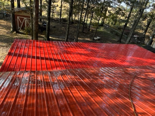 Metal roof soft washing by Premier Shine Wash Co. in McCrory, AR